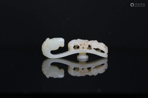 A WHITE JADE 'MONKEY ON HORSE' BELT HOOK, Qing Dyn...