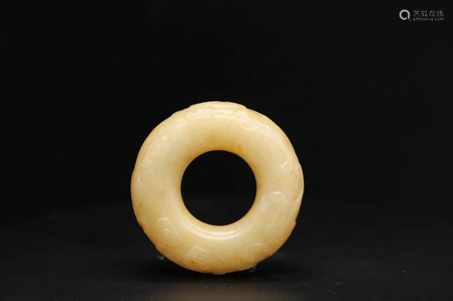 A YELLOW JADE CHILONG CIRCULAR PENDANT, HUAN, SONG OR MING D...