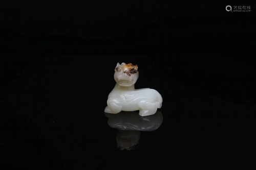 A RARE WHITE JADE CARVING OF A BIXIE, MING OR QING DYNASTY (...