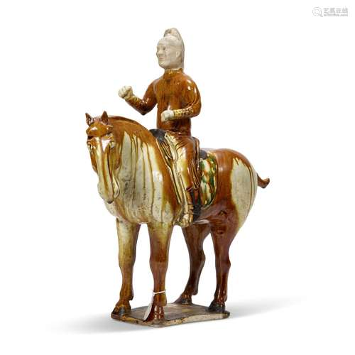 A SANCAI-GLAZED POTTERY FIGURE OF EQUESTRIAN