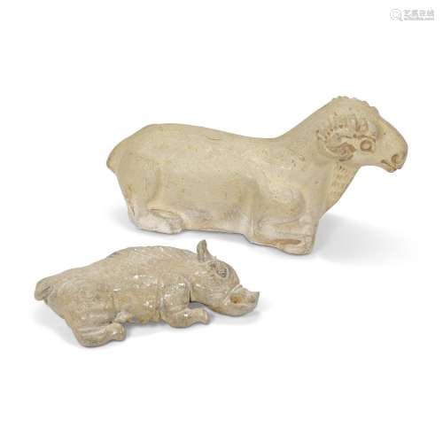 A STRAW-GLAZED MOULDED POTTERY FIGURE OF A RECUMBENT RAM AND...
