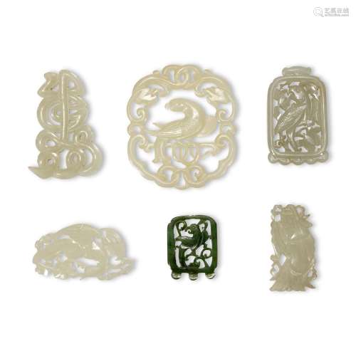 A GROUP OF SIX JADE OPENWORK PENDANTS