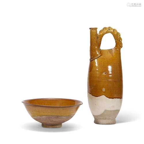 AN AMBER-GLAZED BOWL AND AN AMBER-GLAZED EWER