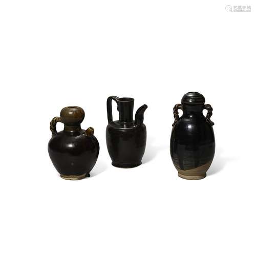 A GROUP OF THREE BLACK-GLAZED CERAMIC VESSELS