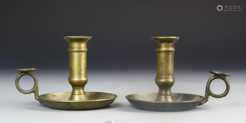 A Pair Of Metal Candle Holders