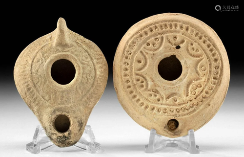 Pair of Roman Imperial Pottery Oil Lamps, Relief Motifs