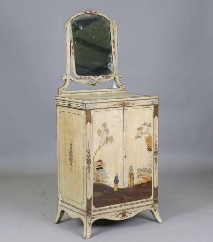 An early 20th century green painted chinoiserie dressing cab...