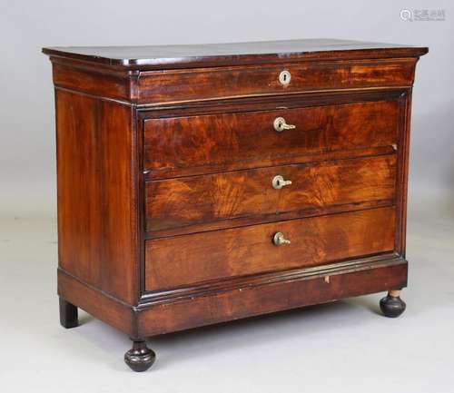 A 19th century French Louis Phillipe mahogany commode, fitte...