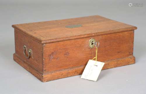 A 19th century oak document box, the hinged lid bearing bras...