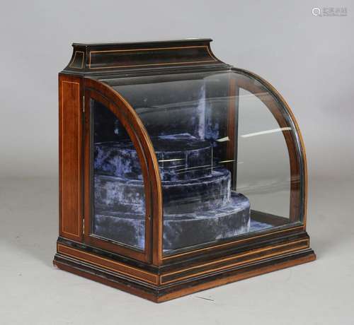 An Edwardian rosewood and boxwood line inlaid counter top bi...