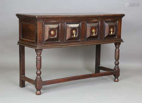 A 17th century oak dresser base, fitted with two drawers wit...