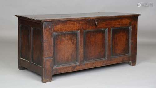 An early 18th century oak panelled coffer, height 60cm, widt...