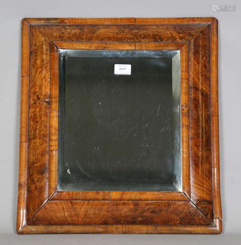 A 19th century William and Mary style burr walnut framed wal...