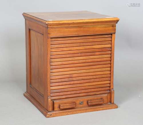 An early 20th century walnut table-top tambour fronted filin...