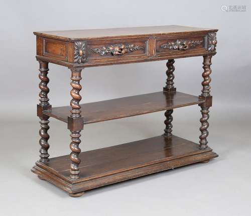 A Victorian oak two-tier buffet, carved with leaf and fruit ...