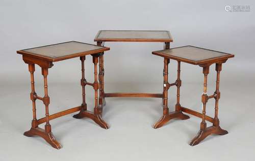 A 20th century reproduction mahogany nest of three occasiona...