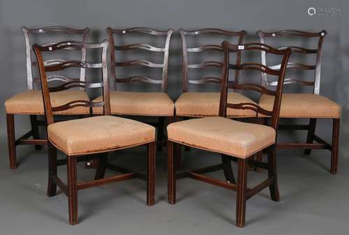 A set of six late George III mahogany dining chairs with pie...