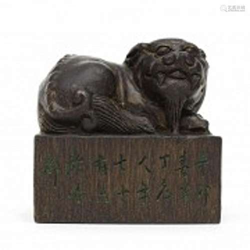 Wooden stamp with carved foo lion, 1951.