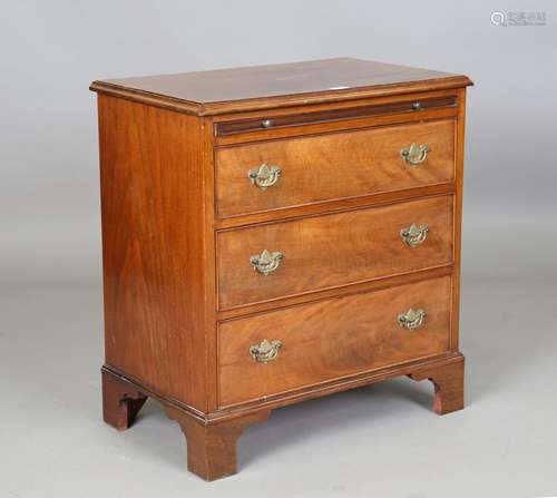 A late 19th century mahogany chest of three graduated drawer...