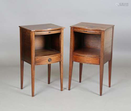 A pair of early 20th century mahogany bowfront bedside cabin...