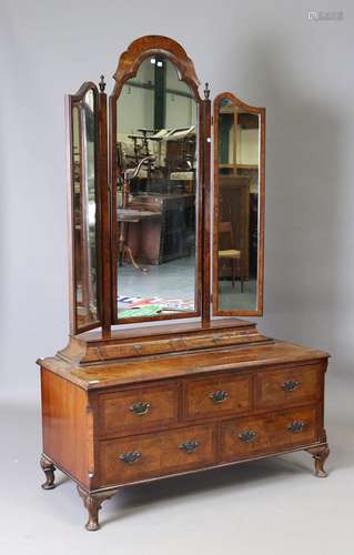 An early 20th century walnut dressing table with triptych fo...