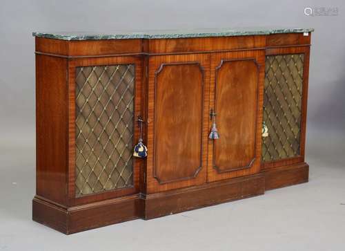 A late 20th century George III style mahogany breakfront sid...