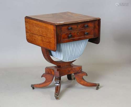 A Regency mahogany drop-flap work table, fitted with two dra...