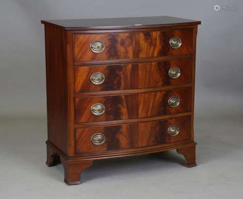 A modern reproduction mahogany bowfront chest of drawers by ...