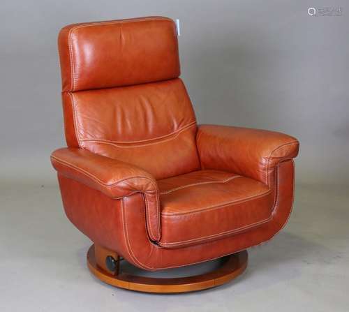 A modern brown leather armchair of retro design, height 100c...