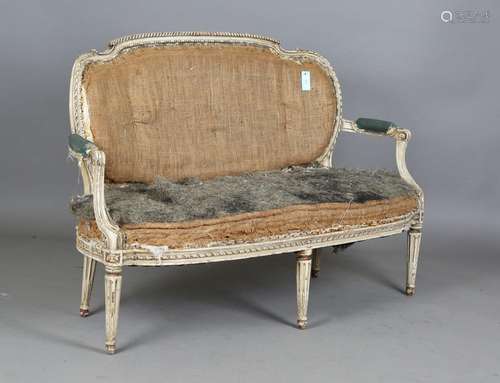 A late 19th century French white painted showframe settee, o...