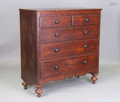 A Victorian provincial oak chest of two short and four long ...