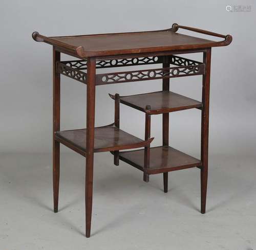 A late Victorian mahogany occasional table, in the manner of...