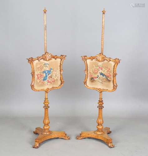 A pair of early Victorian bird's eye maple polescreens, in t...