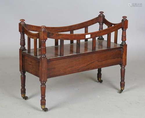 A Regency rosewood book trough, raised on turned legs and br...