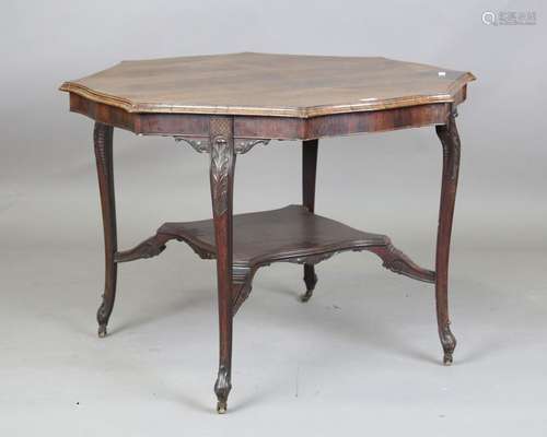 A late Victorian rosewood shaped octagonal centre table, rai...