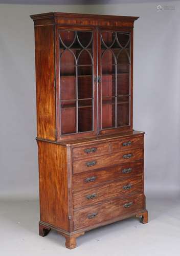 A George III mahogany secrétaire bookcase, the secrétaire dr...