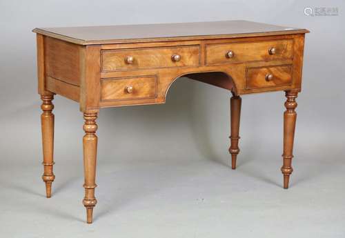 An early Victorian mahogany kneehole writing table, the cros...