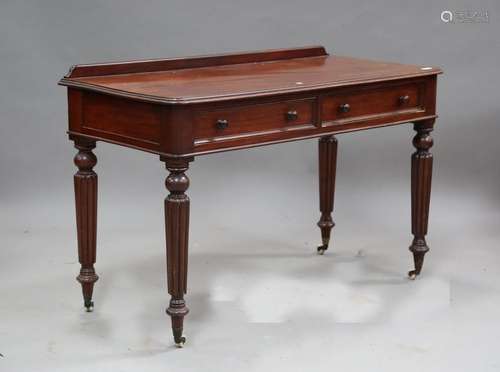 An early Victorian mahogany side table, fitted with two draw...