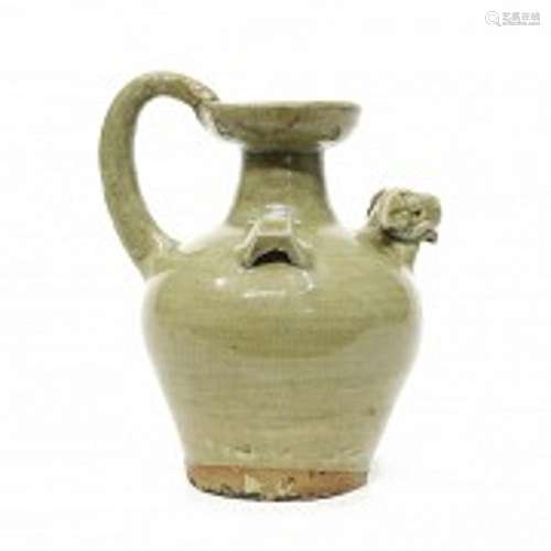 Yue style ceramic jug glazed in green.