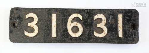 A cast iron smokebox number plate