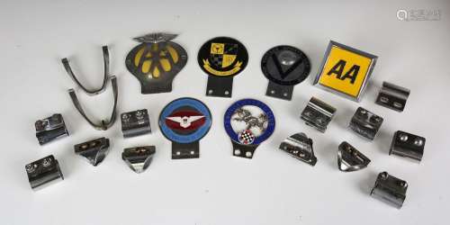 A group of six car badges