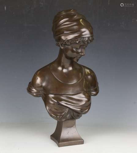 A late 20th century brown patinated moulded resin bust of a ...