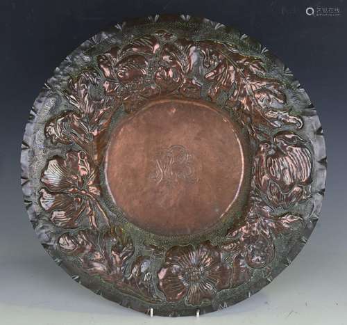 A late 19th century Arts and Crafts copper charger