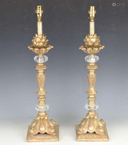 A pair of modern Italianate gilt composition and glass mount...