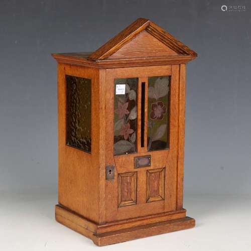 An Edwardian oak table-top postbox