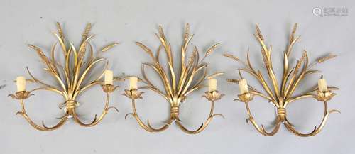 A set of three 20th century gilt metal two-branch wall light...