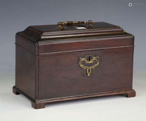 A George III mahogany tea caddy with brass handle and escutc...