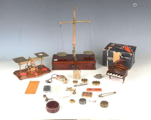 A set of late 19th century mahogany and brass balance scales...