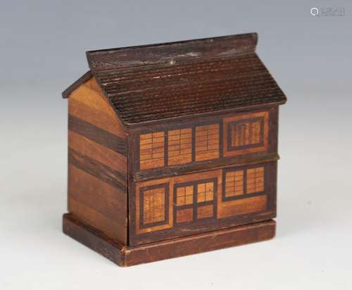 An early 20th century marquetry inlaid novelty money box in ...