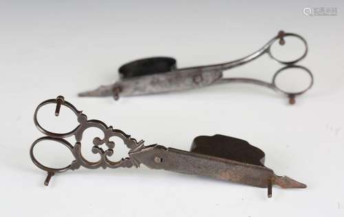 A pair of 18th century cut steel candle snuffers with gadroo...